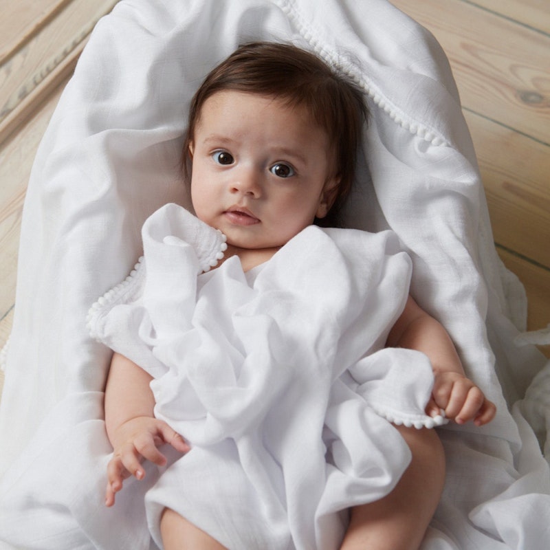 White pom pom baby blanket hotsell